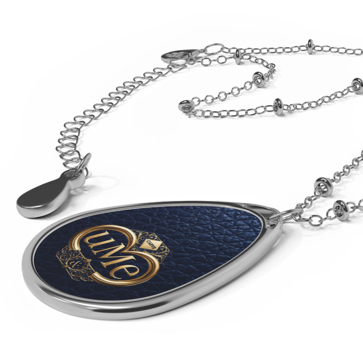 Navy UME Teardrop Pendant Necklace — Silver-Colored Frame & Gold Crest Print