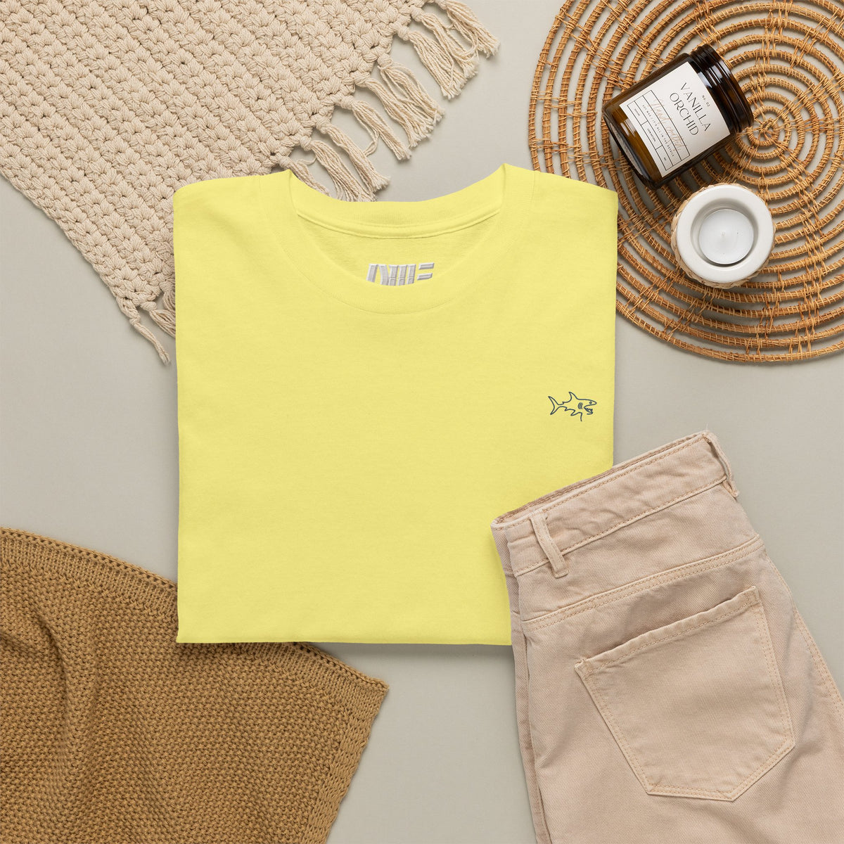 Minimalist string design Fish Tee — Small Chest Fish & Back 'OWE' Graphic