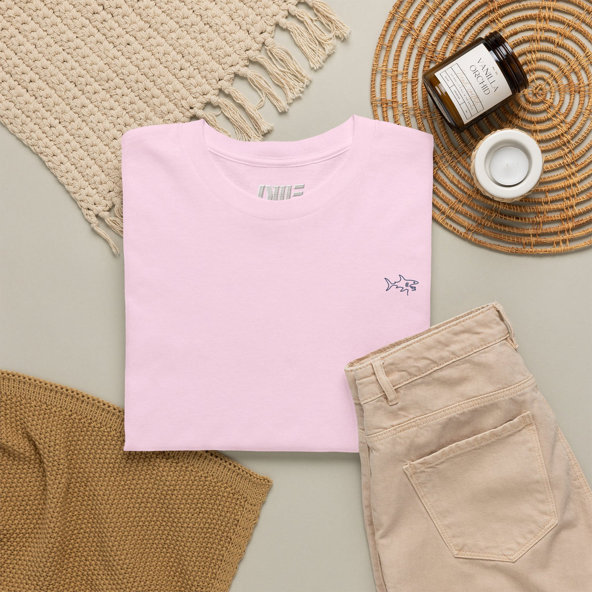 Minimalist string design Fish Tee — Small Chest Fish & Back 'OWE' Graphic