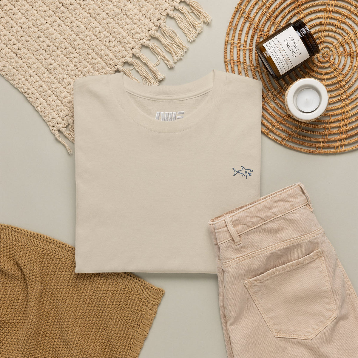 Minimalist string design Fish Tee — Small Chest Fish & Back 'OWE' Graphic