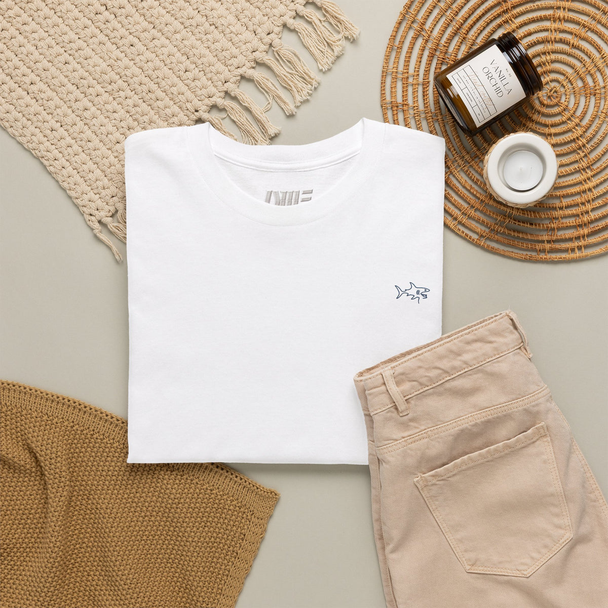 Minimalist string design Fish Tee — Small Chest Fish & Back 'OWE' Graphic