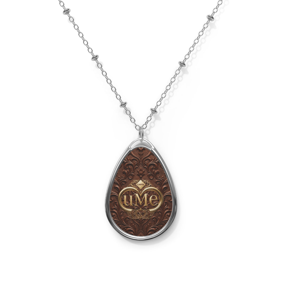 Brown UME Teardrop Pendant Necklace — Silver-Colored Frame & Scroll Print