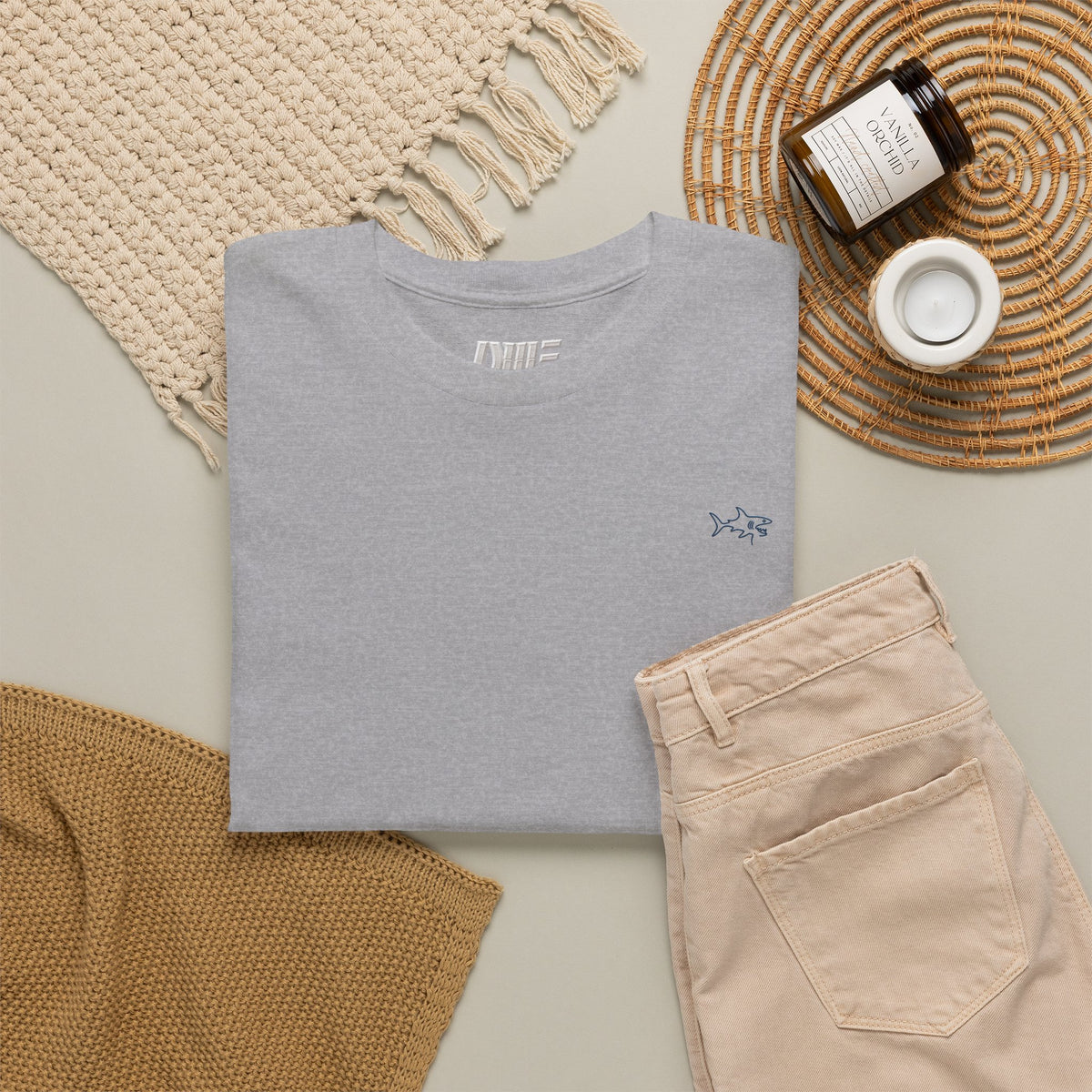 Minimalist string design Fish Tee — Small Chest Fish & Back 'OWE' Graphic