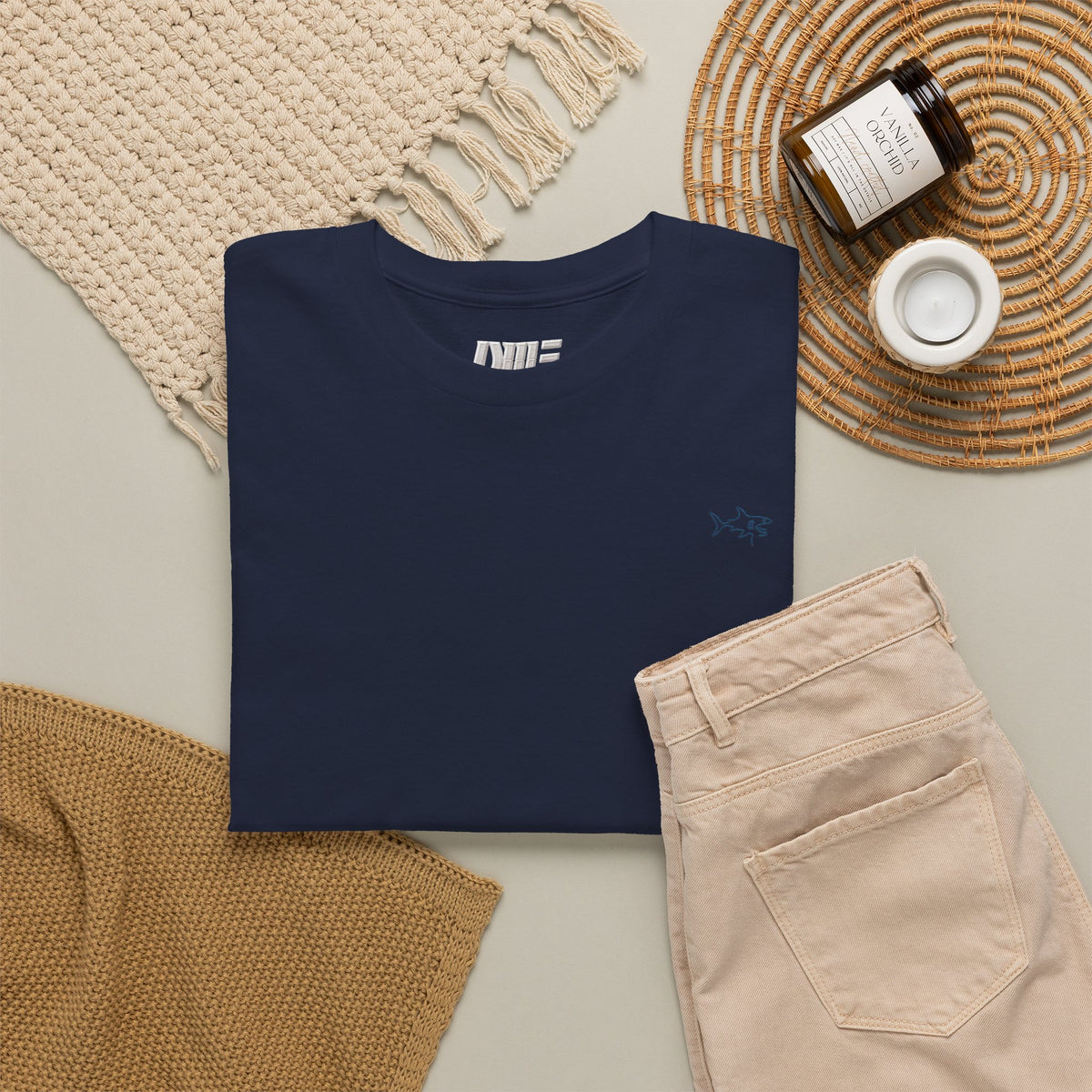 Minimalist string design Fish Tee — Small Chest Fish & Back 'OWE' Graphic