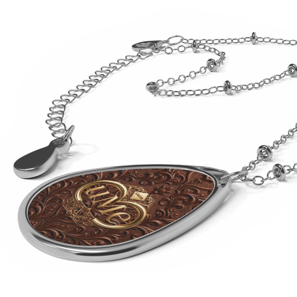 Brown UME Teardrop Pendant Necklace — Silver-Colored Frame & Scroll Print
