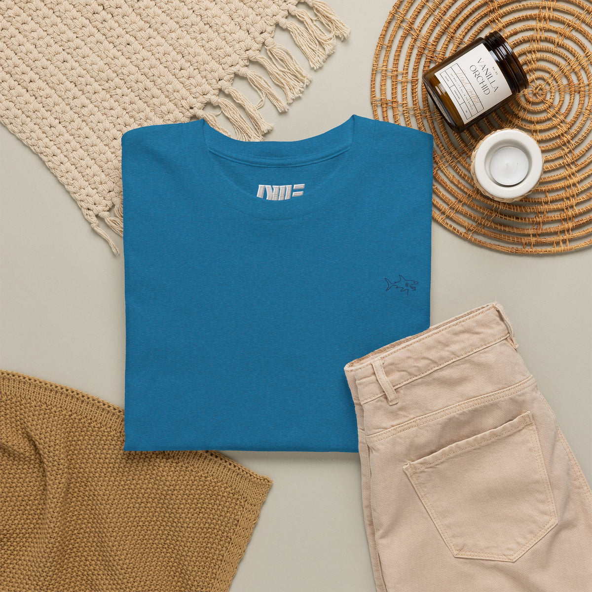 Minimalist string design Fish Tee — Small Chest Fish & Back 'OWE' Graphic