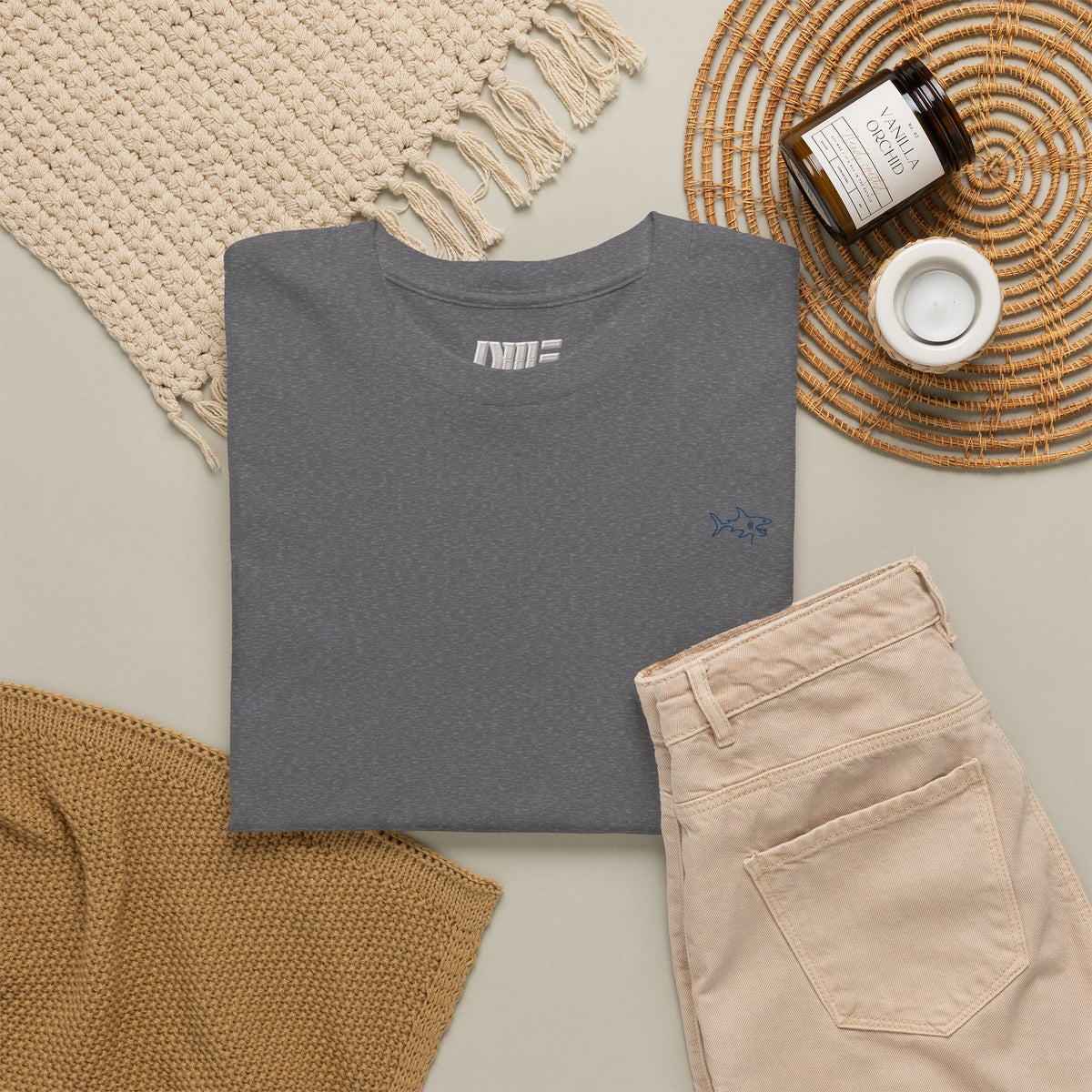 Minimalist string design Fish Tee — Small Chest Fish & Back 'OWE' Graphic