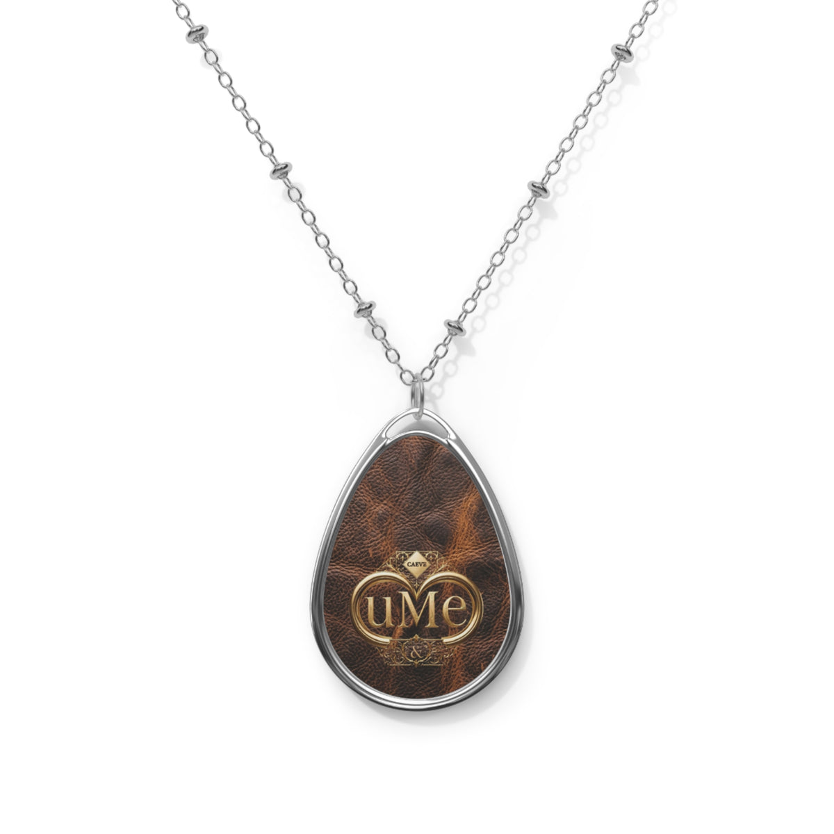 Brown UME Teardrop Pendant Necklace — Silver-Colored Frame & Leather-Look Print